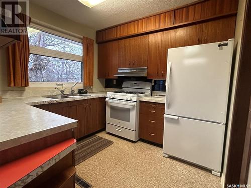 1702 98Th Street, Tisdale, SK - Indoor Photo Showing Kitchen With Double Sink