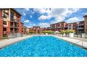 654 Cook Road Unit# 605, Kelowna, BC  - Outdoor With In Ground Pool 