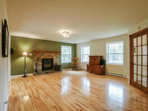 Living room - 2110 Ch. Du Grand-Héron, Sainte-Adèle, QC - Indoor Photo Showing Living Room With Fireplace