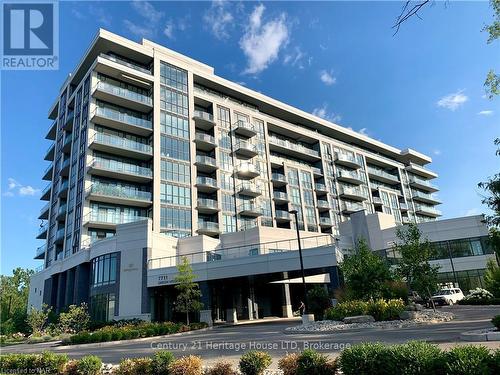 716 - 7711 Green Vista Gate, Niagara Falls (220 - Oldfield), ON - Outdoor With Balcony With Facade