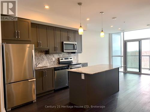 716 - 7711 Green Vista Gate, Niagara Falls (220 - Oldfield), ON - Indoor Photo Showing Kitchen With Upgraded Kitchen