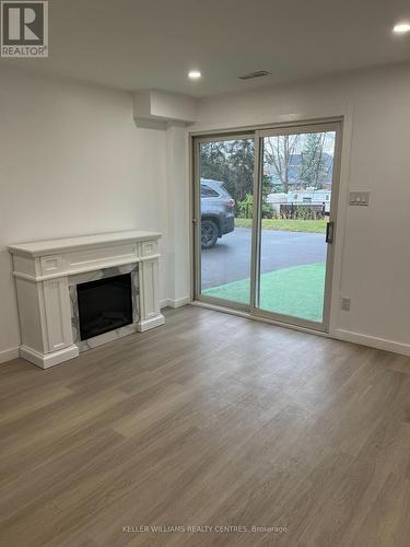 Lower - 146 Carlson Drive, Newmarket, ON - Indoor Photo Showing Living Room With Fireplace