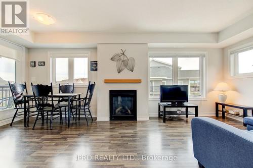 308 - 6 Anchorage Crescent, Collingwood, ON - Indoor Photo Showing Living Room With Fireplace