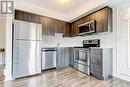 308 - 6 Anchorage Crescent, Collingwood, ON  - Indoor Photo Showing Kitchen With Stainless Steel Kitchen 