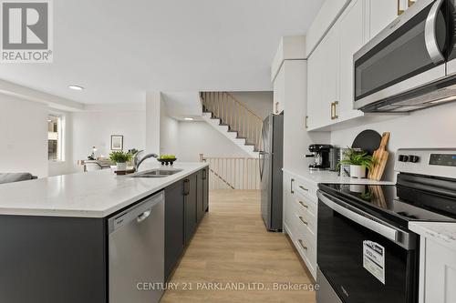 #3 - 160 Densmore Road, Cobourg, ON - Indoor Photo Showing Kitchen With Double Sink