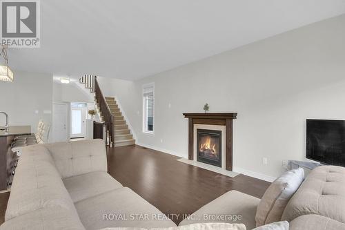 88 Eric Maloney Way, Ottawa, ON - Indoor Photo Showing Living Room With Fireplace