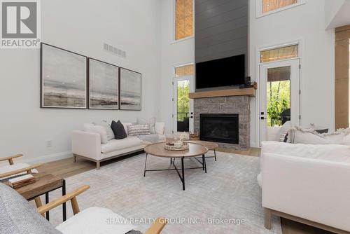 14 St Georges Court, Huntsville, ON - Indoor Photo Showing Living Room With Fireplace