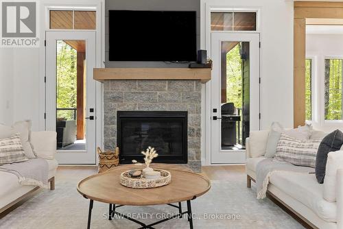 14 St Georges Court, Huntsville, ON - Indoor Photo Showing Living Room With Fireplace