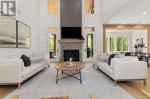 14 St Georges Court, Huntsville, ON - Indoor Photo Showing Living Room With Fireplace