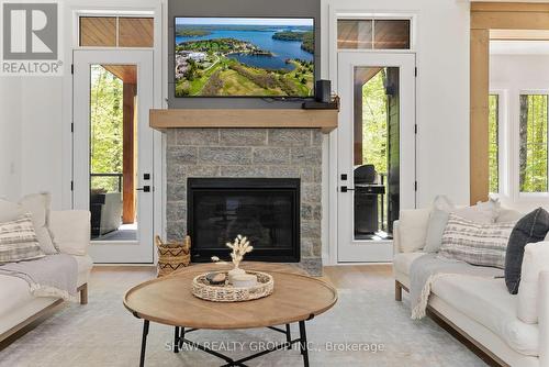 14 St Georges Court, Huntsville, ON - Indoor Photo Showing Living Room With Fireplace