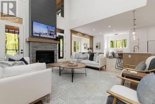 14 St Georges Court, Huntsville, ON - Indoor Photo Showing Living Room With Fireplace