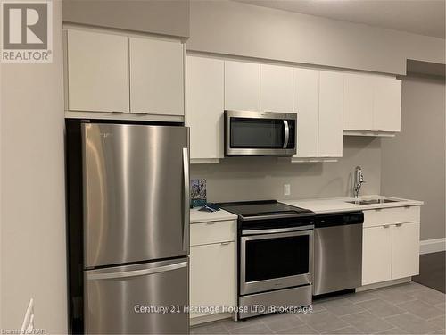 501 - 73 Arthur Street S, Guelph (Two Rivers), ON - Indoor Photo Showing Kitchen With Stainless Steel Kitchen With Double Sink