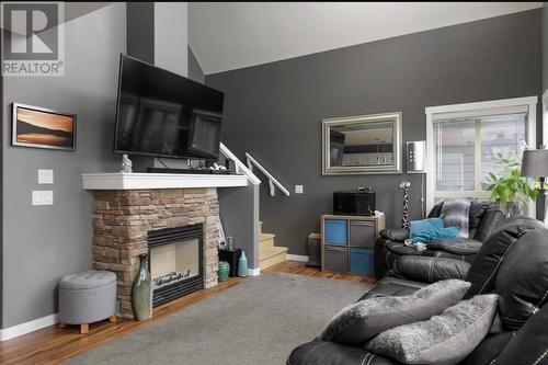 6822 Madrid Way Unit# 310, Kelowna, BC - Indoor Photo Showing Living Room With Fireplace