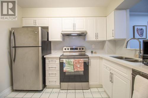 801 - 430 Mclevin Avenue, Toronto, ON - Indoor Photo Showing Kitchen With Double Sink