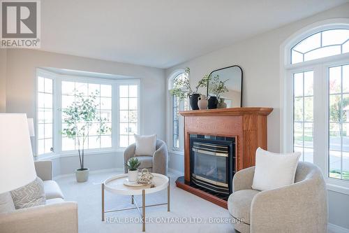 1142 Deacon Drive, Milton, ON - Indoor Photo Showing Living Room With Fireplace