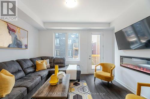 1375 Shevchenko Boulevard, Oakville, ON - Indoor Photo Showing Living Room With Fireplace