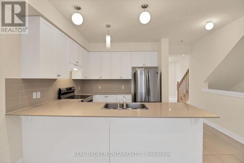 7 Steamboat Way, Whitby, ON - Indoor Photo Showing Kitchen With Double Sink