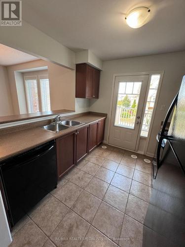 829 Fowles Court, Milton, ON - Indoor Photo Showing Kitchen With Double Sink