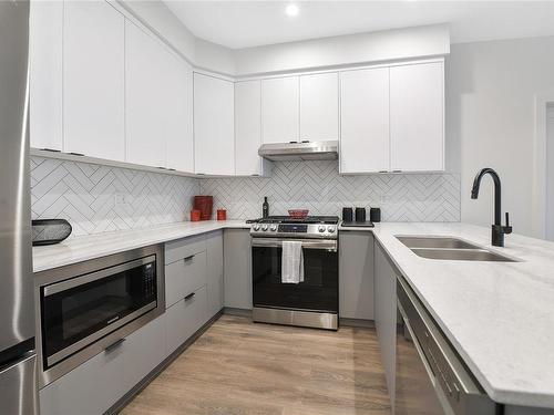 304-1110 Samar Cres, Langford, BC - Indoor Photo Showing Kitchen With Double Sink With Upgraded Kitchen