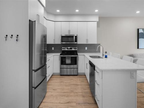 408-280 Island Hwy, View Royal, BC - Indoor Photo Showing Kitchen With Stainless Steel Kitchen With Double Sink