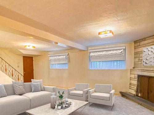 Basement - 10335  - 10339 Rue J.-J.-Gagnier, Montréal (Ahuntsic-Cartierville), QC - Indoor Photo Showing Living Room With Fireplace