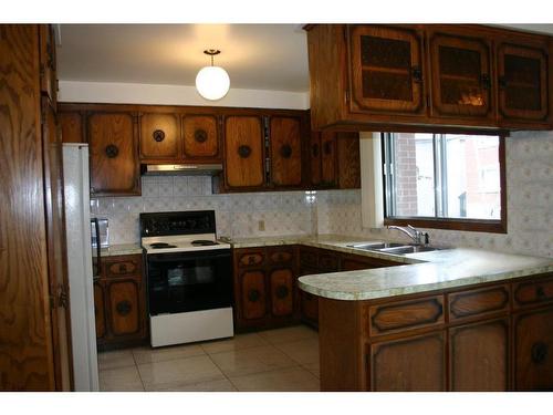 Kitchen - 10335  - 10339 Rue J.-J.-Gagnier, Montréal (Ahuntsic-Cartierville), QC - Indoor Photo Showing Kitchen With Double Sink