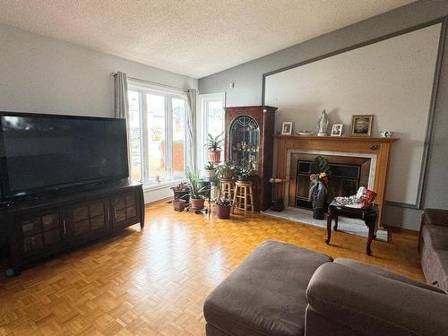 Living room - 280 Rue Sackville, Laval (Auteuil), QC - Indoor Photo Showing Living Room With Fireplace