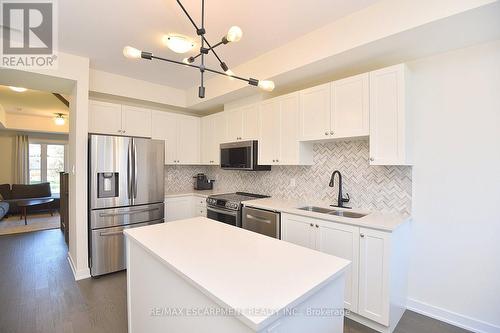 5 - 383 Dundas Street E, Hamilton, ON - Indoor Photo Showing Kitchen With Stainless Steel Kitchen With Double Sink