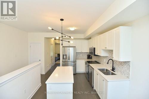 5 - 383 Dundas Street E, Hamilton, ON - Indoor Photo Showing Kitchen With Stainless Steel Kitchen With Double Sink