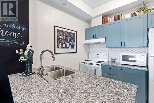 #413 - 84 Aspen Springs Drive, Clarington, ON - Indoor Photo Showing Kitchen With Double Sink