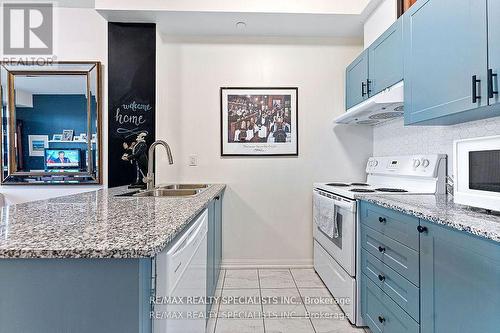 #413 - 84 Aspen Springs Drive, Clarington, ON - Indoor Photo Showing Kitchen With Double Sink