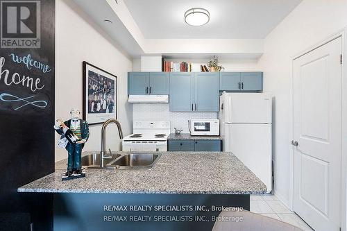 #413 - 84 Aspen Springs Drive, Clarington, ON - Indoor Photo Showing Kitchen With Double Sink