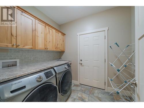 4889 Canium Court, 108 Mile Ranch, BC - Indoor Photo Showing Laundry Room