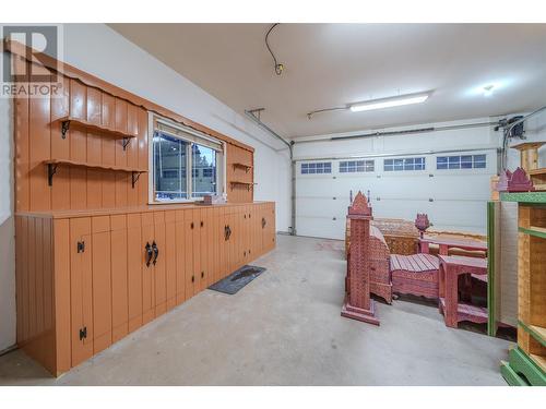 4889 Canium Court, 108 Mile Ranch, BC - Indoor Photo Showing Garage