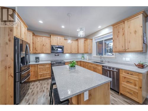 4889 Canium Court, 108 Mile Ranch, BC - Indoor Photo Showing Kitchen With Stainless Steel Kitchen With Double Sink