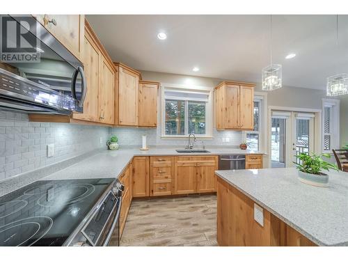 4889 Canium Court, 108 Mile Ranch, BC - Indoor Photo Showing Kitchen With Upgraded Kitchen