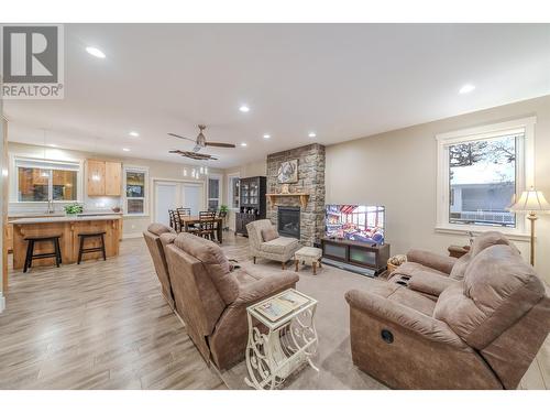 4889 Canium Court, 108 Mile Ranch, BC - Indoor Photo Showing Living Room With Fireplace