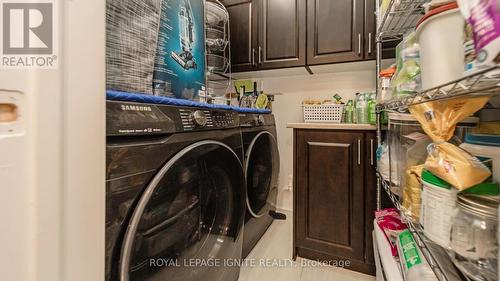 810 - 320 Dixon Road, Toronto, ON - Indoor Photo Showing Laundry Room