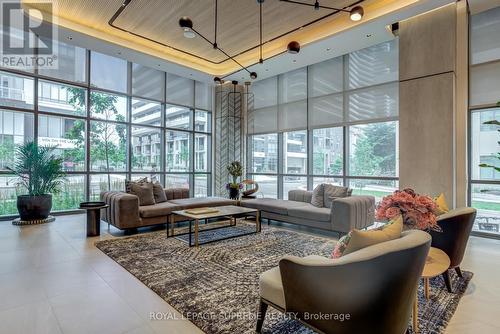 203 - 65 Annie Craig Drive, Toronto, ON - Indoor Photo Showing Living Room