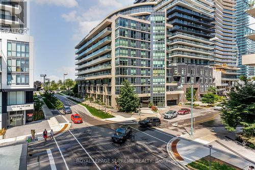 203 - 65 Annie Craig Drive, Toronto, ON - Outdoor With Balcony With Facade