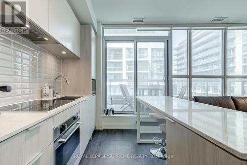 203 - 65 Annie Craig Drive, Toronto, ON - Indoor Photo Showing Kitchen With Upgraded Kitchen