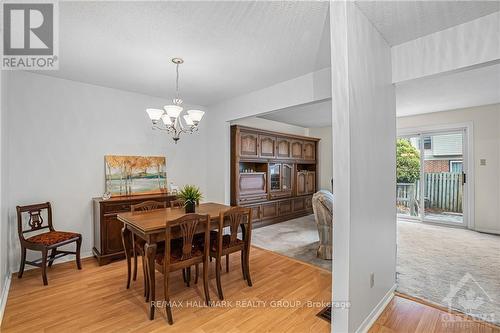 FORMAL DINING ROOM can host large parties.  NOTE: wood laminate floors and freshly painted walls. - 840 Cahill Drive W Unit#20, Ottawa, ON - Indoor Photo Showing Dining Room