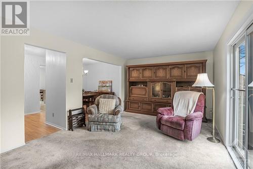 Plush carpet gives the LIVING ROOM a cozy feeling on Ottawa's cold winter evenings. - 840 Cahill Drive W Unit#20, Ottawa, ON - Indoor Photo Showing Other Room