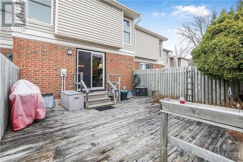 Back gate accesses a walkway to PARKING #C31. - 840 Cahill Drive W Unit#20, Ottawa, ON - Outdoor With Exterior