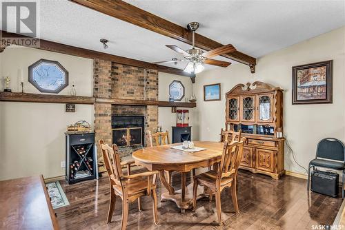 6103 Parsons Bay, Regina, SK - Indoor Photo Showing Dining Room With Fireplace