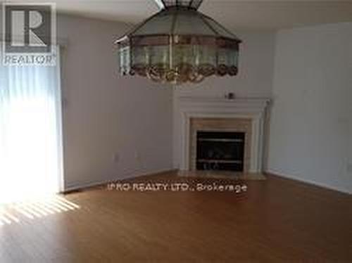 8 - 5260 Mcfarren Boulevard, Mississauga, ON - Indoor Photo Showing Living Room With Fireplace