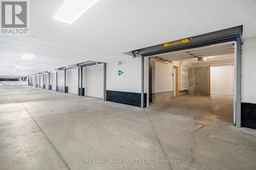 4 - 25 Heron Park Place, Toronto, ON - Indoor Photo Showing Garage