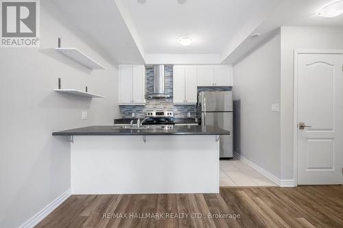 4 - 25 Heron Park Place, Toronto, ON - Indoor Photo Showing Kitchen With Double Sink