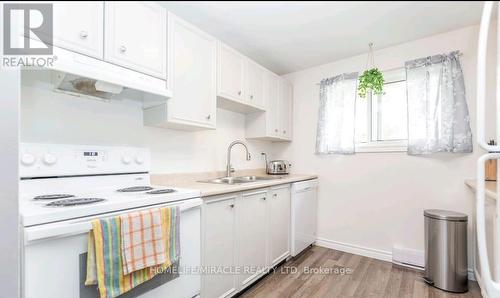 32 Loggers Run, Barrie, ON - Indoor Photo Showing Kitchen With Double Sink