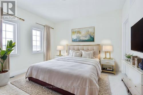 24 Cottonwood Street, Springwater, ON - Indoor Photo Showing Bedroom